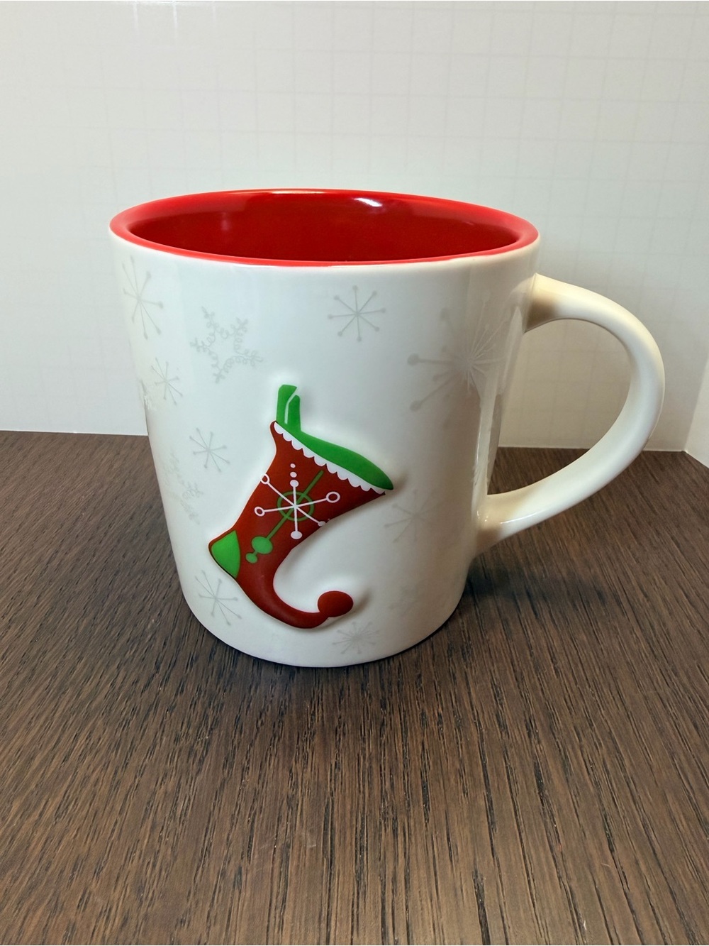 Starbucks White Ceramic Mug with Red Interior and Green/Red Stocking Motif